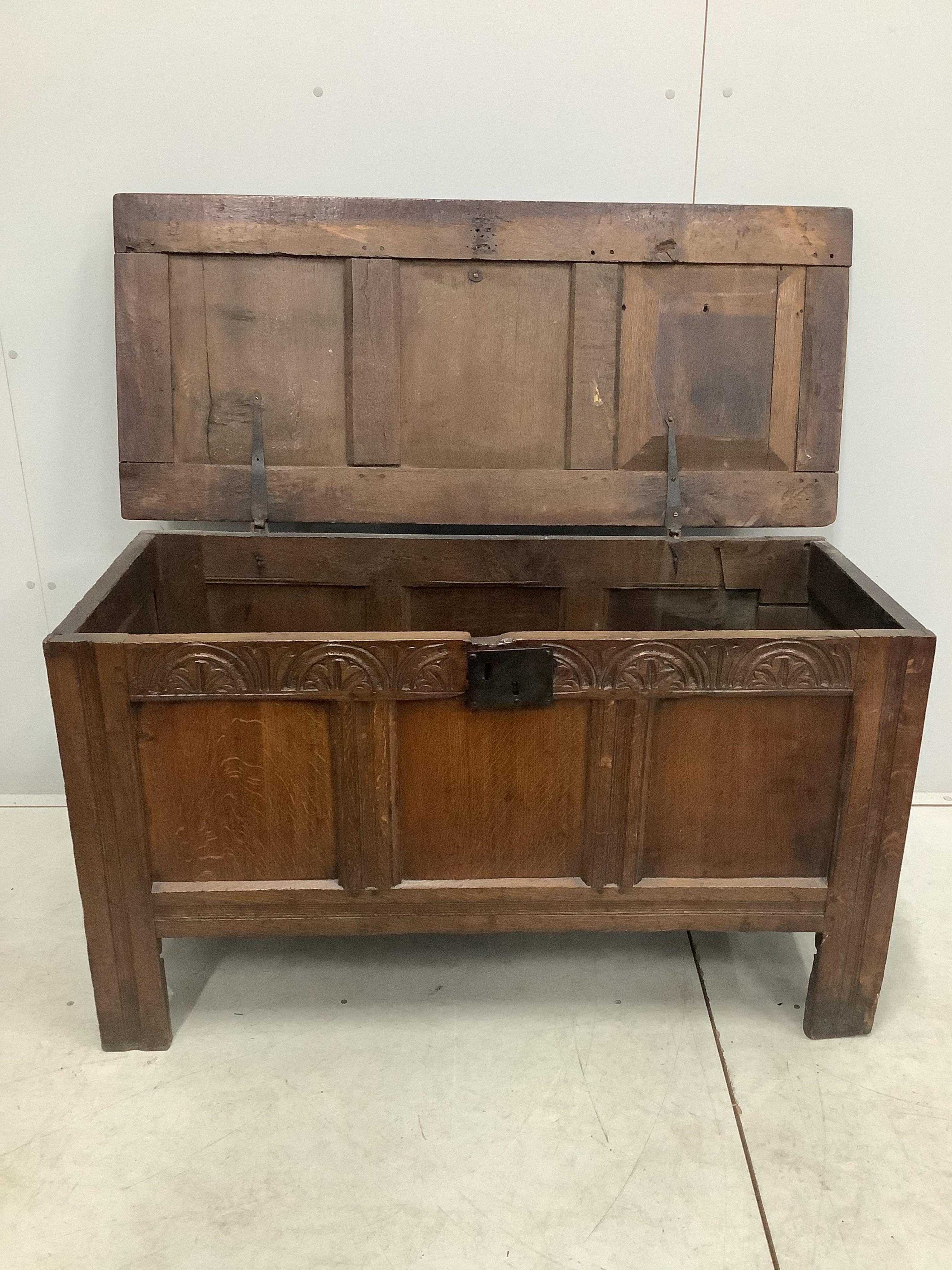 A late 17th century carved oak coffer, width 123cm, depth 53cm, height 70cm. Condition - fair